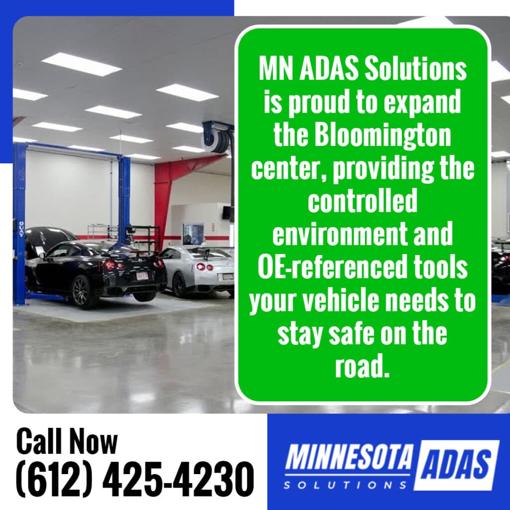 Vehicle undergoing ADAS calibration at Minnesota ADAS Solutions using manufacturer-specific targets in a controlled facility