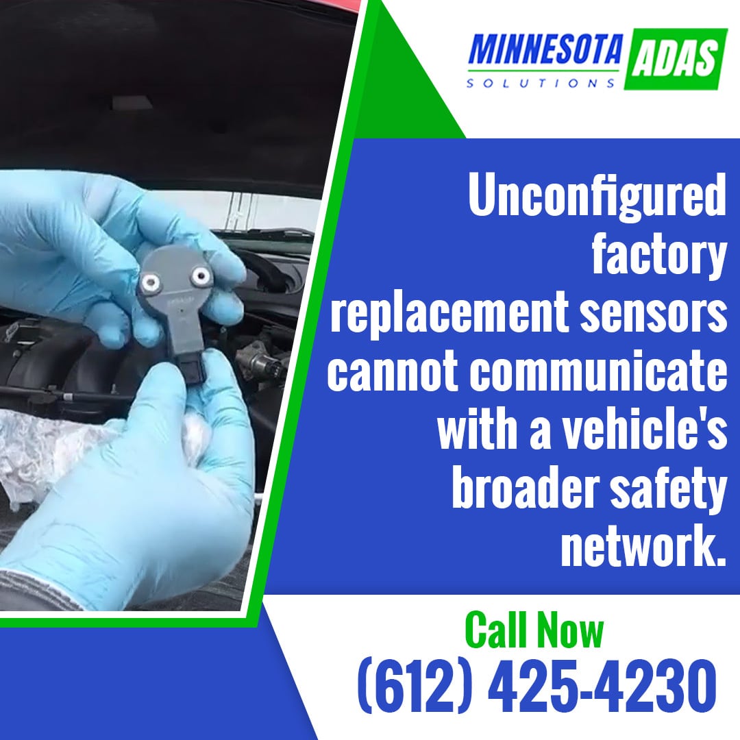 Hands in blue nitrile gloves holding a small electronic replacement sensor in front of an open car engine bay.